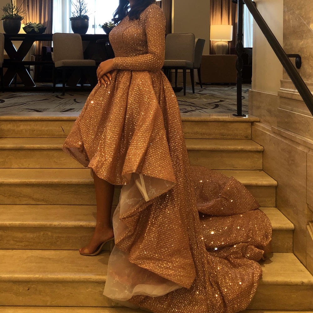 Rose gold pink and covered in crystal dress